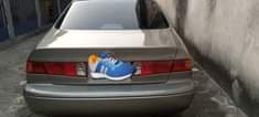 A picture of Toyota Camry 2002 model with chilling AC Eket 1 250k