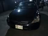 A picture of Honda accord 2005 model 4plugs