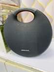 A picture of Harman Kardon onyx studio 6 Bluetooth rechargeable powerful speaker at