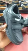 A picture of Kids black shoes