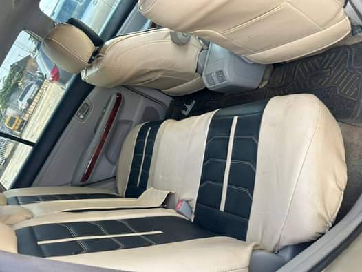 A picture of Toks standard Lexus Rx 350 08 with Tesla model and