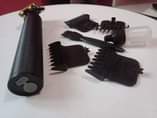 A picture of Kemel hair cutting original inakaa na chaji NASA s matatu