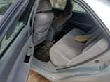 A picture of NIGERIA USED TOYOTA CAMRY 2004 model smoking engine and good