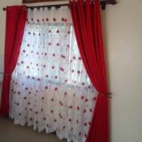 A picture of curtains and rods