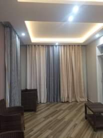 A picture of CURTAINS CARPETS