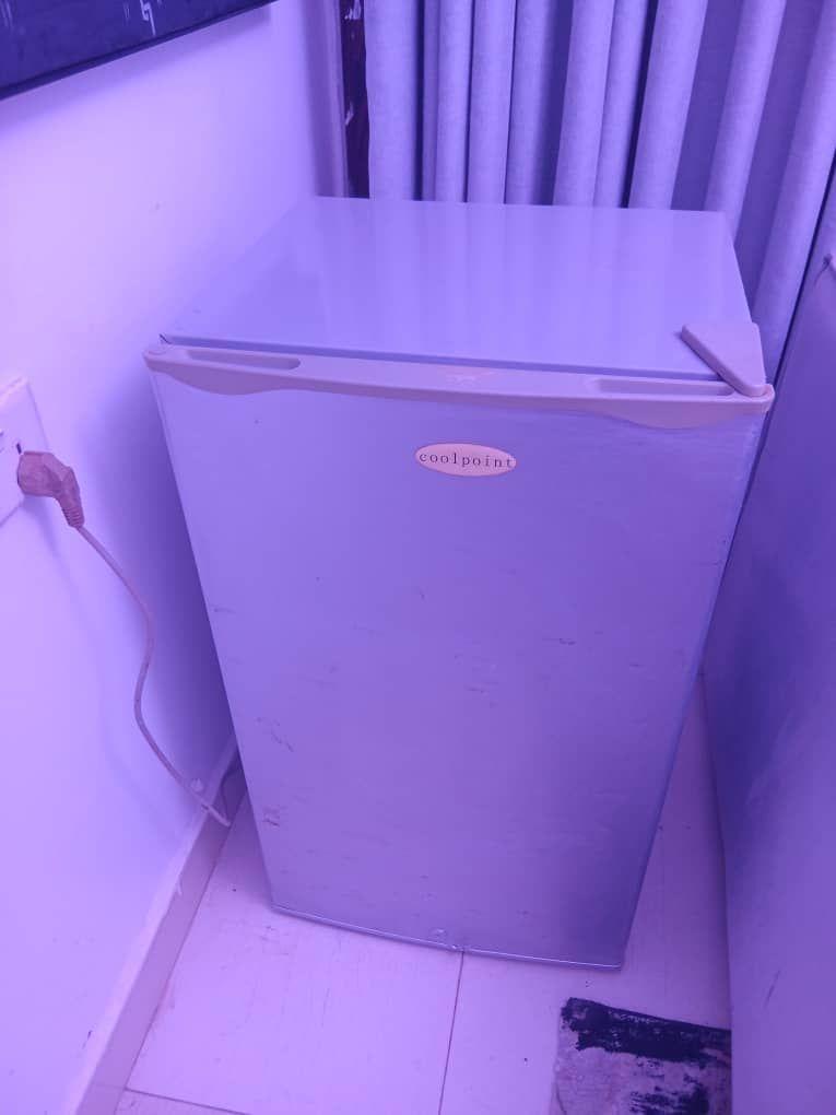 A picture of So clean and neat table top fridge