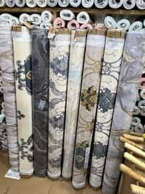 A picture of Wallpapers and adhesive stickers 0705374901 0776763178.