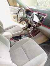 A picture of Super clean Toks standard white 2006 model with android and