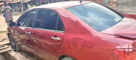 A picture of Clean in and out Toyota Corolla with very sharp Engine