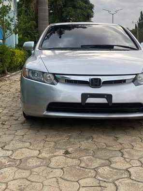 A picture of Awuff deal Super clean honda civic irobot Accident free AC