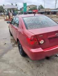 A picture of Toyota Corolla 2004 Engine tapping little Gear and AC ok