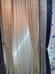 A picture of Curtains and rode