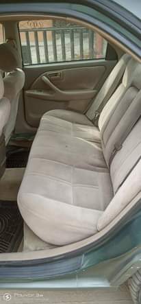 A picture of Sharp Toyota Camry AKA Tiny Light Engine AC Chilling Everything