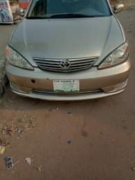 A picture of Toks standard reg Toyota camry 2003 model painted twice condition