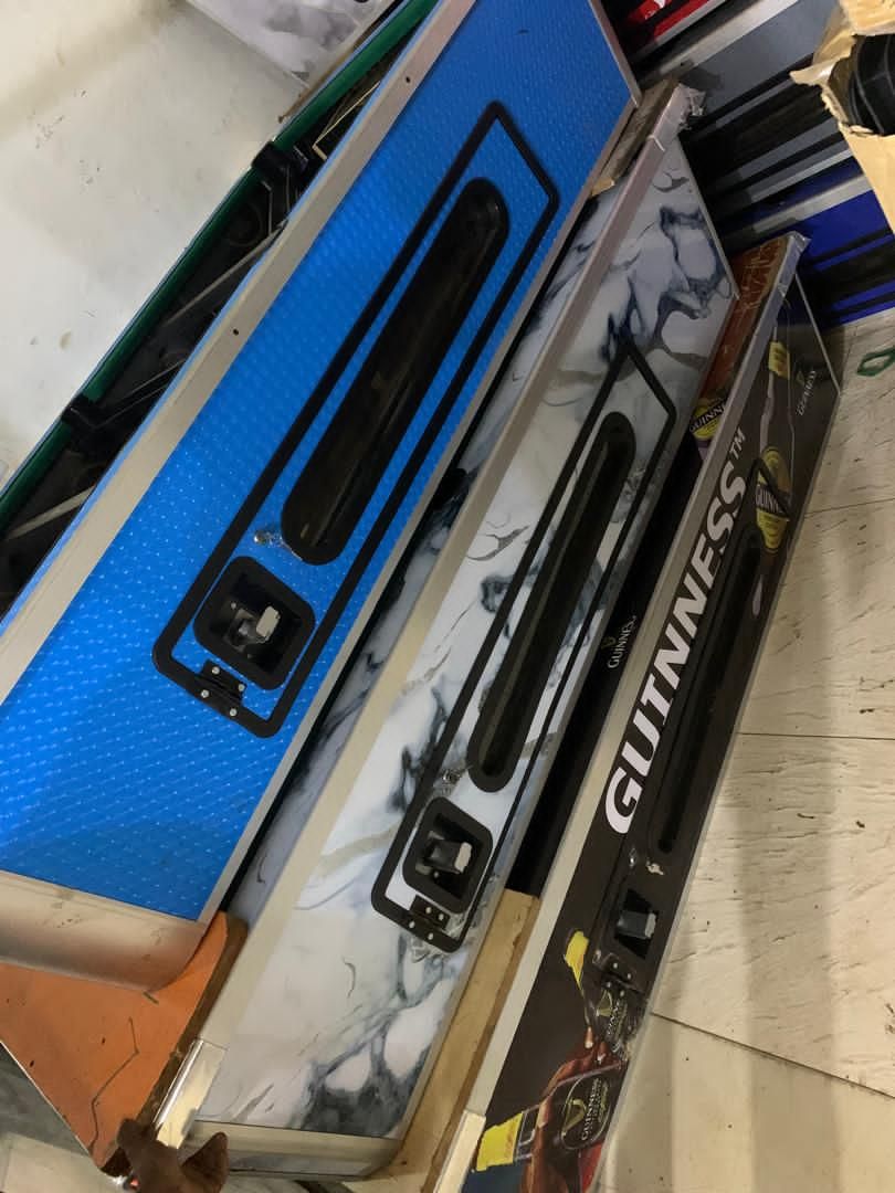 A picture of Pool tables and sports equipments