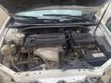A picture of Toyota Camry 2004 4plugs engine baked on first body Good