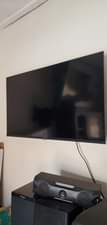 A picture of Hisense smart tv 40 inches plus the new woofer both