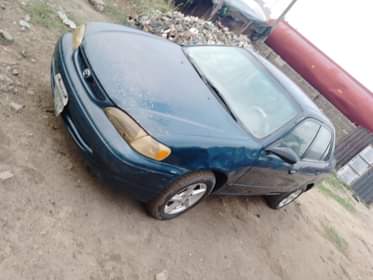 A picture of Oyaooo rush oo Dealers market Toyota Corolla 2000 model Everything