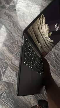 A picture of 2020 MacBook Pro m1 with finger print