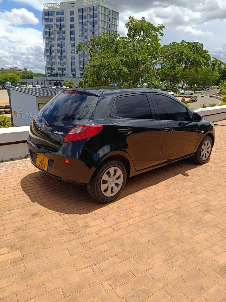 A picture of REGISTERED MAZDA DEMIO FOR SALE Location Lilongwe