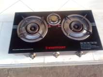 A picture of Three plate gas stove