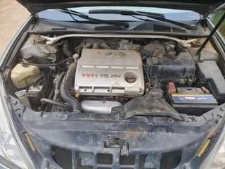 A picture of Registered Lexus Es330 Engine gear and AC Android screen First