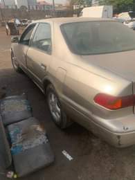 A picture of Toyota Camry evilop with untouched engine and gear location Ibadan