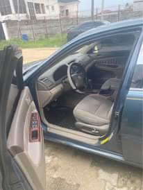 A picture of AWOOF AWOOF DEALERS DEAL. DIRECT 2004 TOYOTA CAMRY FULL OPTION