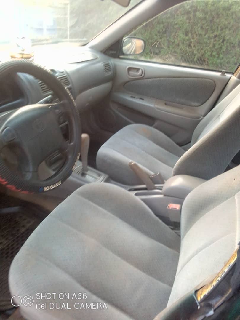A picture of Toyota Corolla okerejuowo very neat and clean first body. Engine