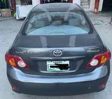 A picture of Sharp toks standard Toyota Corolla 2010 With THUMBS START BOTTON