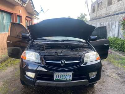 A picture of Registered 2003 Accura MDX quick sale 100 in and out