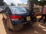 A picture of Lady Driven Subaru Legacy