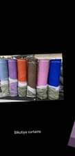 A picture of Curtains nets and rods available call 0705378395