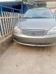 A picture of Toyota Corolla le 2004 Color Gray Properly Used All documents