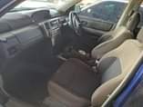 A picture of Nissan xtrail 2.0 2006 model driving perfectly full house big