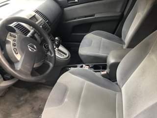 A picture of URGENT BUYER NEEDED Nissan Sentra 2009 model Factory AC clean