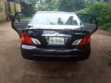 A picture of Toyota Avalon dashboard in pristine condition buy and drive Aba
