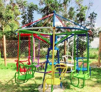 A picture of Kids Merry go round swing for sale