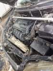 A picture of Nigeria used Toyota Corolla engine is smoking gear is neat