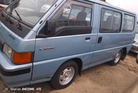 A picture of Mitsubishi L300 bus with absolutely nothing to fix engine is