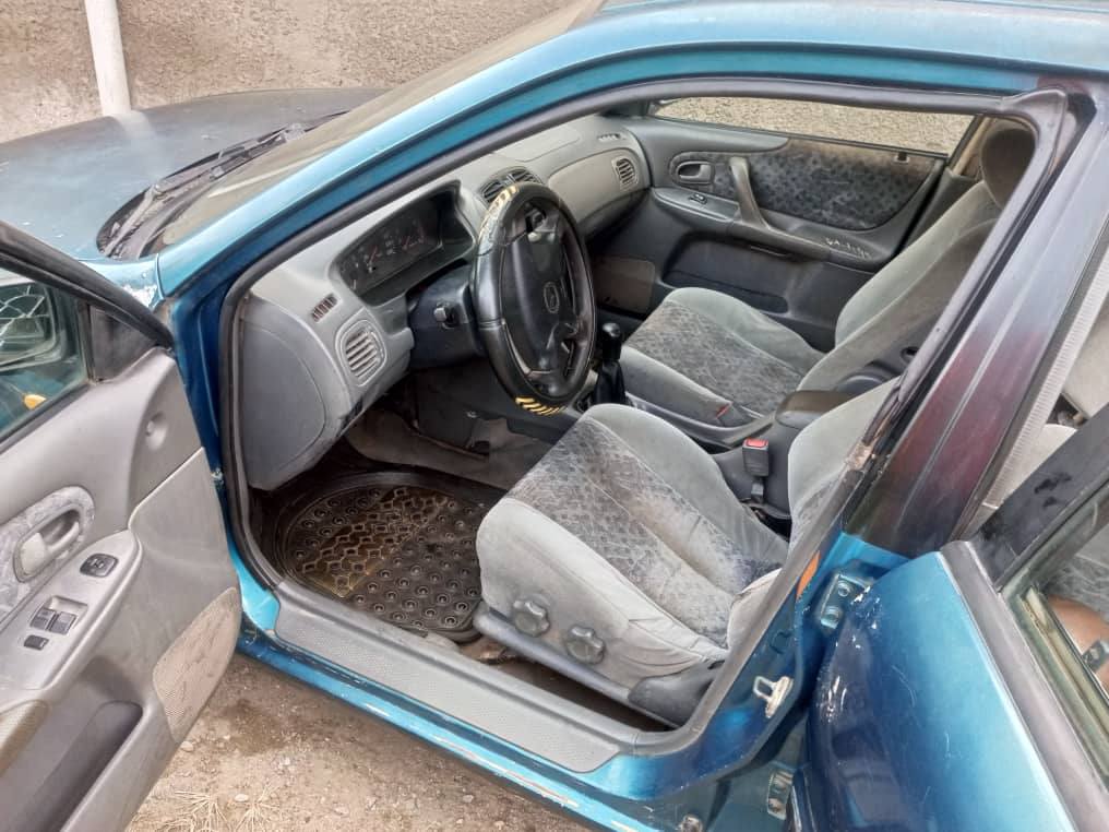 A picture of Very Strong MAZDA 323