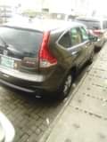 A picture of Neatly naija used Honda CR V 013 model Jeep