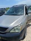A picture of Lexus Rx 330 Ac and engine needs attention