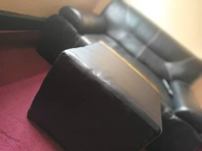 A picture of Leather sofa and it s prof on sale price 250k