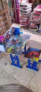 A picture of Kids reading tables