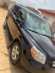 A picture of Clean Nigerian Used Black Honda Pilot 2008 Repainted 3row leather