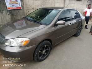 A picture of Toyota Corolla 2005 engine has tapping sound gear and ac