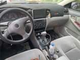 A picture of 2004 Toyota Corolla Baked body Engine Gear And AC in