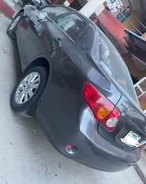 A picture of Sharp toks standard Toyota Corolla 2010 With THUMBS START BOTTON