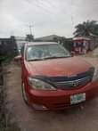 A picture of Toyota 2004 engine grear AC cool painted on first body